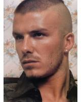 David Beckham with punky bald head.jpg
