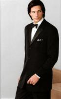 Tuxedo medium long hairstyle, black hair with side bang pulled behind the back on both sides