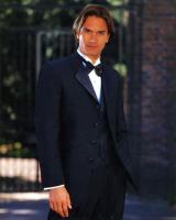 Tuxedo Medium long hairstyle with long bangs.jpg