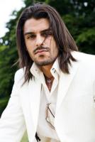 Men long layered hairstyle in dark brown.jpg