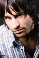 Men medium hairstyle with long bangs.jpg