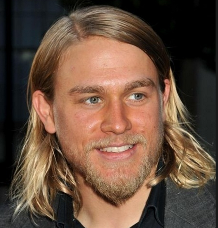 Charlie Hunnam pictures with his long layered hairstyle with long side bangs

