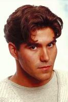 Mans Short Hair Style with wavy curly bangs
