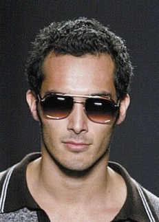 men short fashionable hairstyle wearing very cool sunglasses
