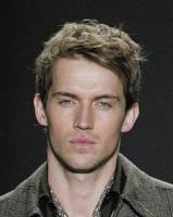 Image of short messy haircut men with wavys and layers on the top