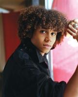 medium black curly hairstyle for men.jpg