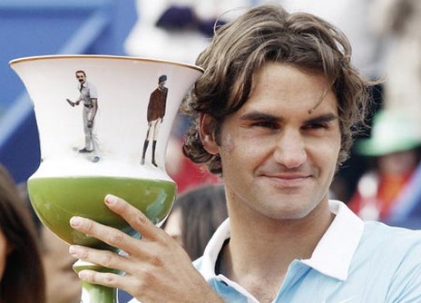 Roger Federer tennis player with medium long curly hairstyle.jpg
