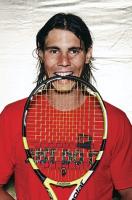 Rafael Nadal in weat hair_Nadal racket.jpg