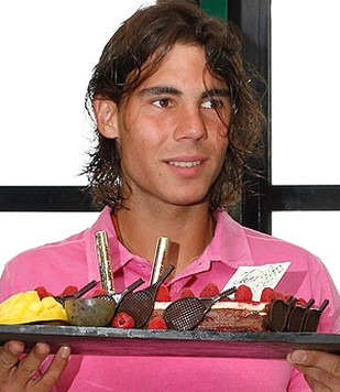 with wet hair Rafael Nadal celebrates his 21st birthday during the French Tennis Open.jpg
