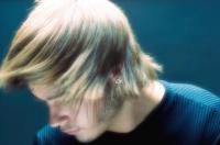 Medium men hairstyle with every long bangs in blonde.jpg