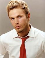man medium blond hairstyle.jpg