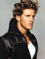 Man medium wavy hairstyle.jpg