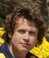 Medium hair style for man with curly hair.jpg
