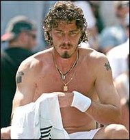 sexy Marat Safin with his wild long curly hair
