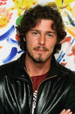 Marat Safin with wavy and curly hair in medium length