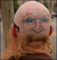 Funny haircut and tattoo combination - eyes in the back of the head.jpg