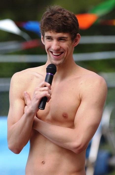 half nude Michael Phelps with short wavy hairstyle.jpg
