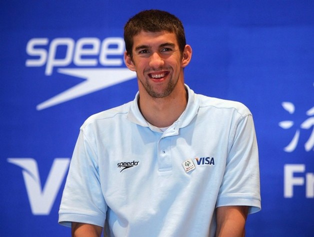 young Michael Phelps with short dark hair.jpg
