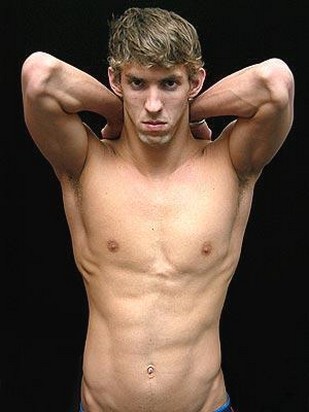Michael Phelps with wavy hairstyle and light curly bang.jpg