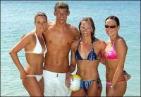Michael Phelps with sexy girls in bikini_all four are Olympic swimmers.jpg