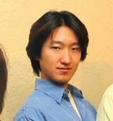 medium hairstyle with long side bangs for Asian man
