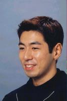 Asian man with short haircut