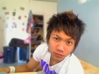 Asian Boy Haircut with long layered bang with spikes on the top
