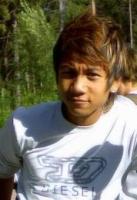 Asian Boy Hair Style with high lights with very cool and funky swept bang and top