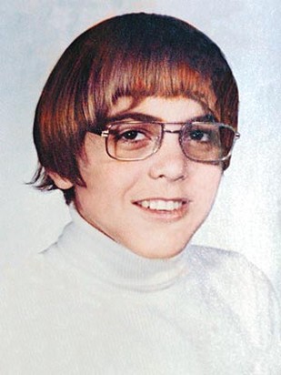young George Clooney with a cool geek hairstyle.jpg
