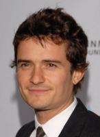 Orlando Bloom with very short curly hair.jpg