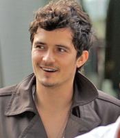 Orlando Bloom with short wavy hair.jpg