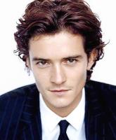 Orlando Bloom with medium wavy hairstyle.jpg