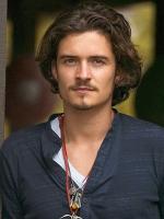 Orlando Bloom with medium long hairstyle with waves.jpg