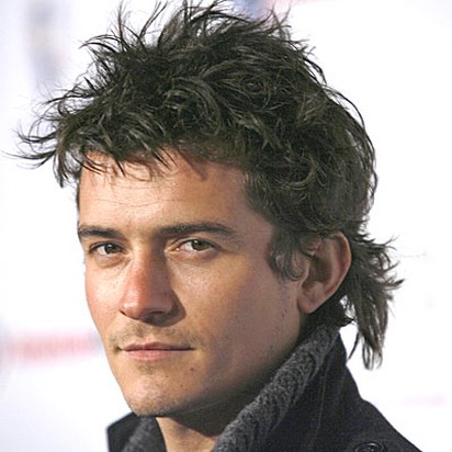 Orlando Bloom with medium hair with messy style.jpg