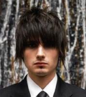 trendy men hairstyle with spikes and layers in medium length.jpg
