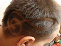men haircut with a music note hair.jpg