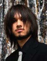 long trendy hairstyle for men.jpg