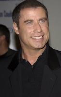 John Travolta picture with him having very short haircut.jpg