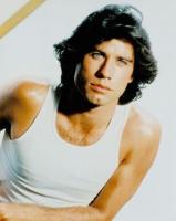 John Travolta with his medium long wavy hairstyle with side bangs_very sexy looking men.jpg