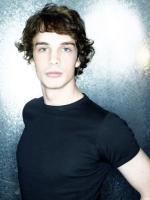 men modern curly hairstyle.jpg