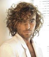Long medium messy curly hairstyle for men.jpg