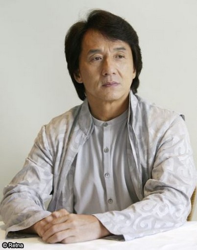 Jackie Chan with medium haircut with long side bangs.jpg
