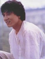 Jackie Chan with medium hairstyle with long bang.jpg