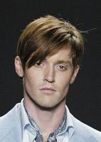 Men's Short Hair Style with very long side bangs with layers in red brown