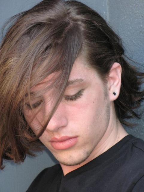 medium long man hairstyle with long side bangs.jpg