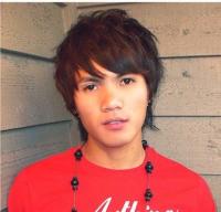 Medium short Asian men haircut with layers and long side bangs.jpg