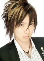 picture of trendy Asian man haircut with layers and high lights and long side bangs.jpg
