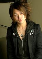 young Asian men haircut with layers and long side bangs.jpg