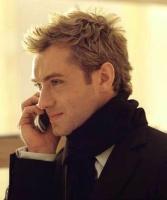 Jude Law with medium short spiky hairstyle.jpg