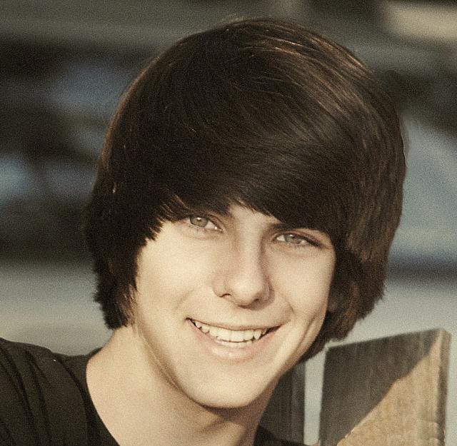 mediun teen hairstyle with long swept bang pictures.jpg